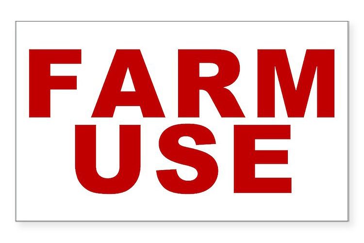 Farm use tags photo, red text on a white background
