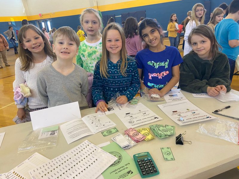 group of children smiling at the camera